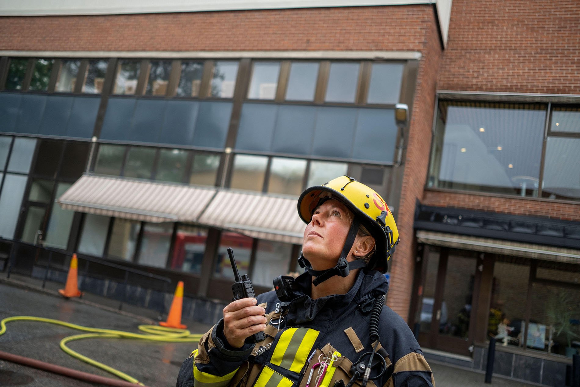 Firefighter-in-front-of-building-web